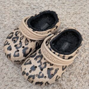 CROCS Tan Leopard Print Clogs with Black Lining